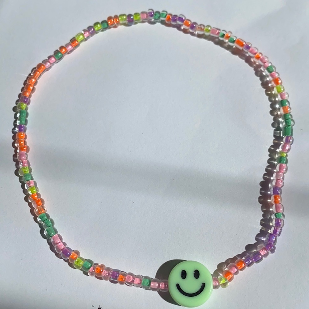 Stretchy handmade smiley face beaded choker necklace